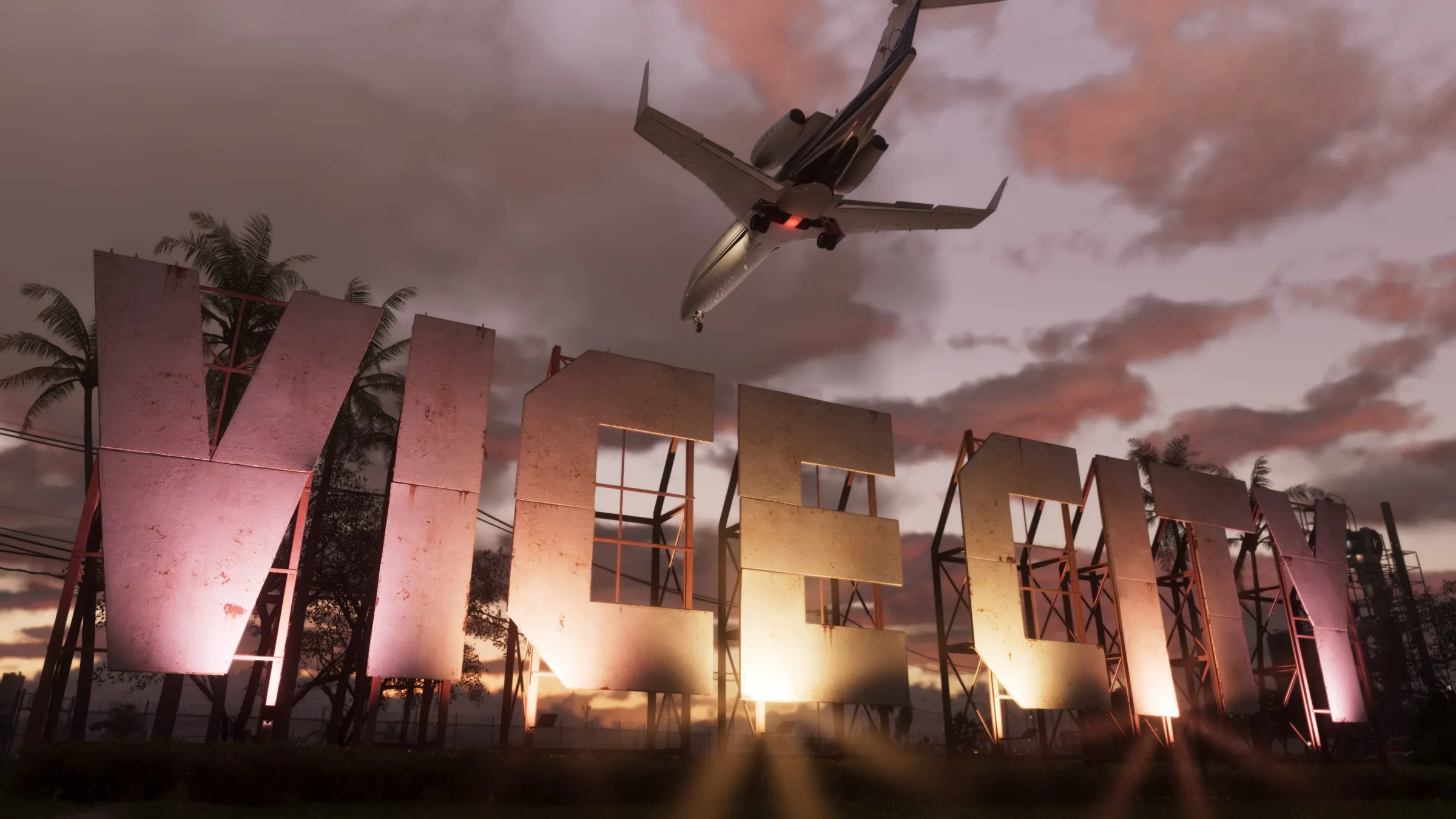 A passenger jet flies above a large illuminated Vice City sign and palm trees at sunset.